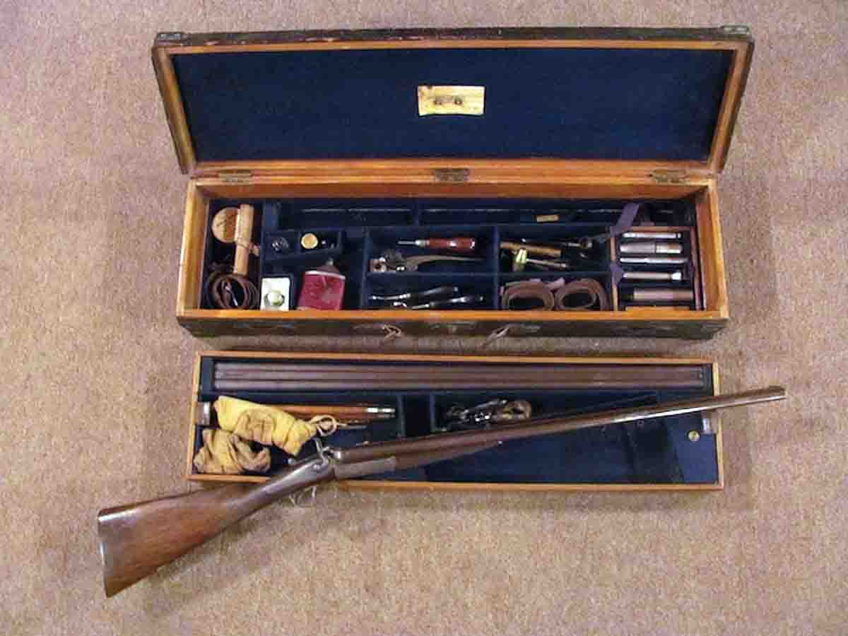 The 12-bore shotgun barrels are shown resting on the top tier of the case with the rifle’s forend and cleaning implements.  The lower tier shows the rifle barrels and all reloading and cleaning items for both the shotgun and .577-500 No.2 cartridge – complete after 138 years!